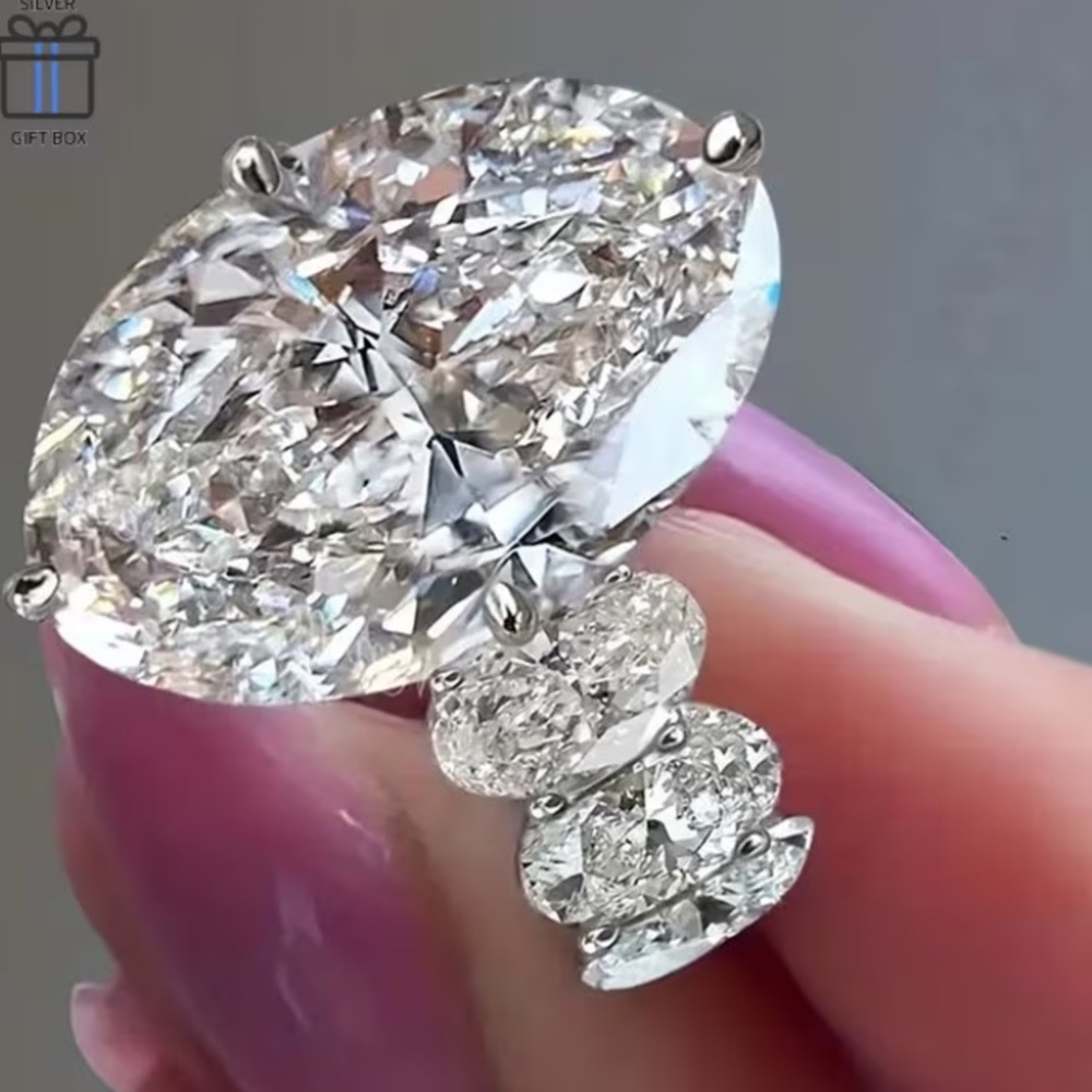 Elegant Oval Cut Diamond Engagement Ring in Silver